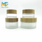 15ml 30ml 50ml 100ml clear frosted glass cream jar with bamboo cap empty eye cream glass jar