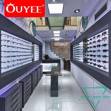 Wholesale Fashion Mdf And Glass Manufacturer Optical Shop Interior Counter Table Showroom Decoration Design
