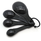 Practical cheap promotional gift black 4pcs 4" food grade plastic measuring tea spoons scoops set for baking coffee