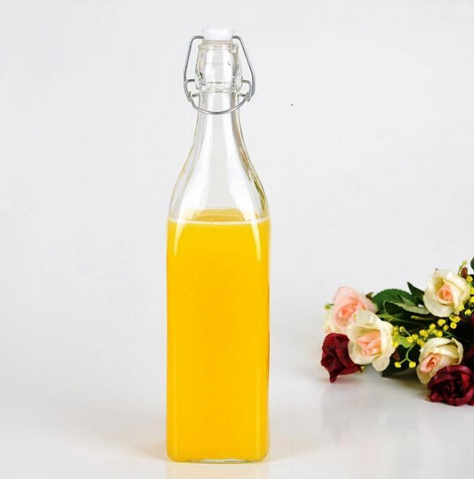 Wholesale Haonai Eco-Friendly food grade clear glass bottle with lock lid