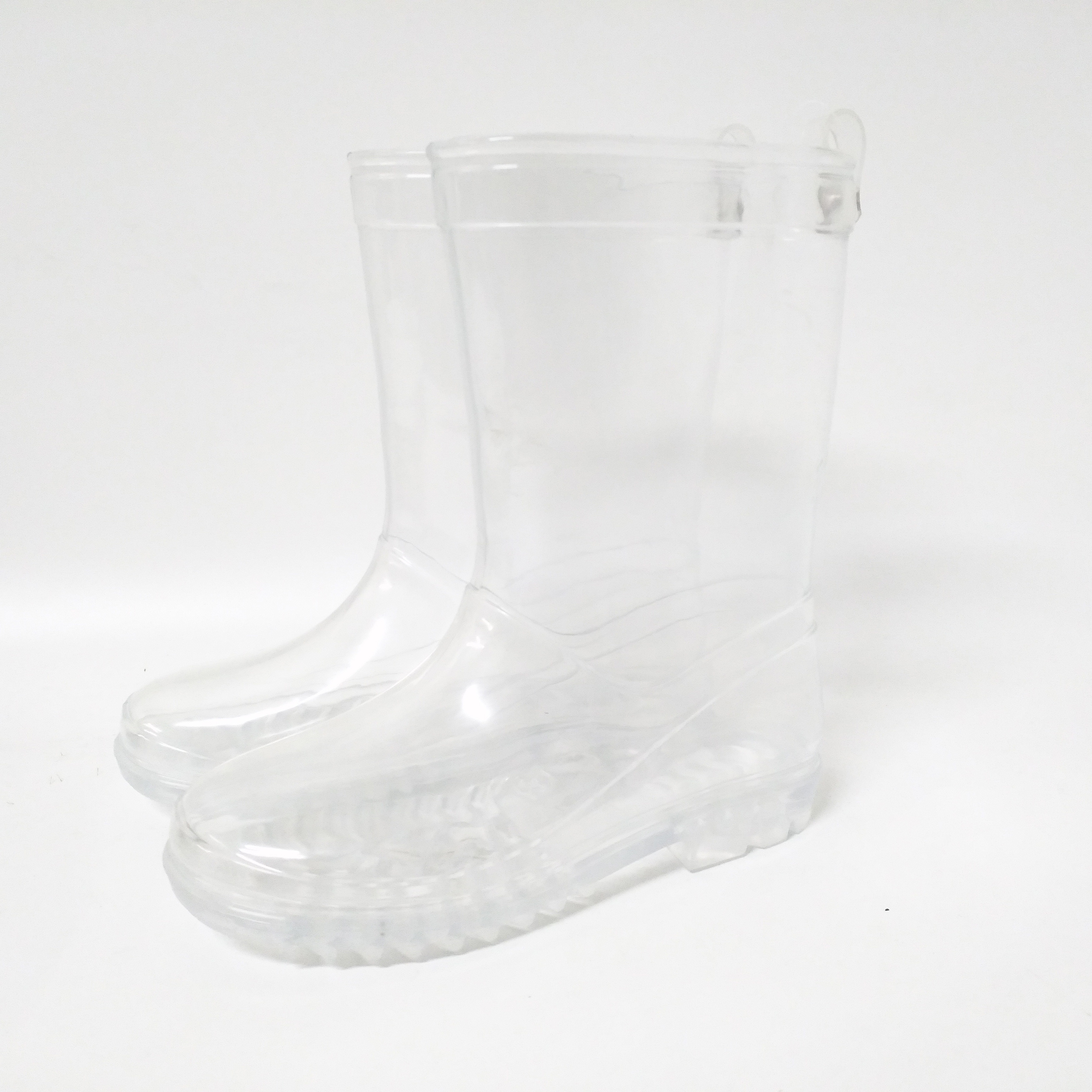 clear plastic rain boots over shoes