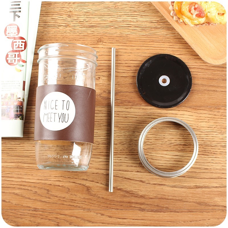 Haonai glass mason jar with split metal lid,stainless steel straw and PU cover,500ml drinking glass jar.
