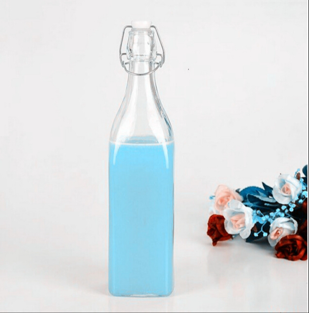Wholesale Haonai Eco-Friendly food grade clear glass bottle with lock lid