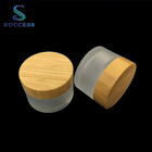 50g wholesale frosted glass cosmetic jar with wood lid for skin care sale