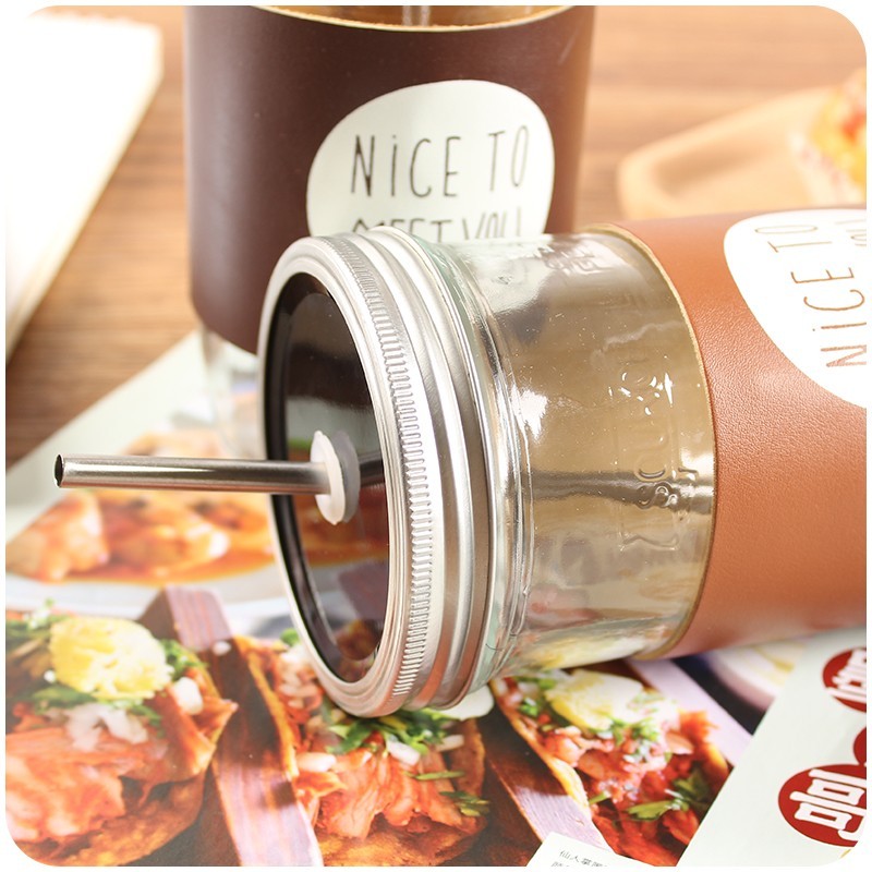 Haonai glass mason jar with split metal lid,stainless steel straw and PU cover,500ml drinking glass jar.