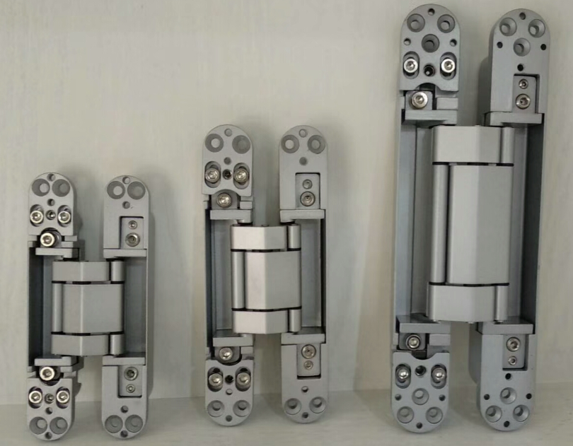 Adjustable concealed hinge for wooden door
