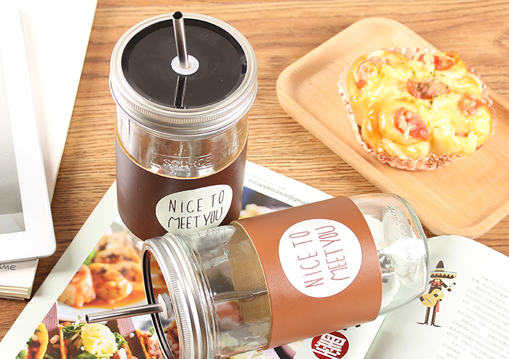 Haonai glass mason jar with split metal lid,stainless steel straw and PU cover,500ml drinking glass jar.