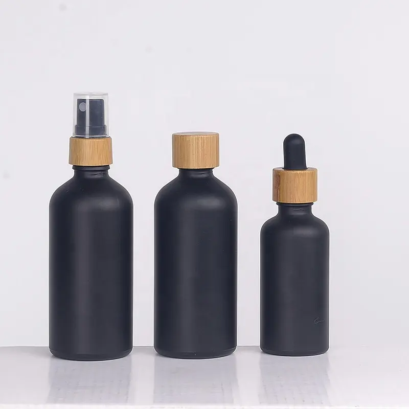 Экологичная матовая черная стеклянная бутылка, 1 унция, 2 унции, 30 мл, 50 мл, 60 мл, 100 мл, стеклянная бутылка с пипеткой и бамбуковой крышкой сверху