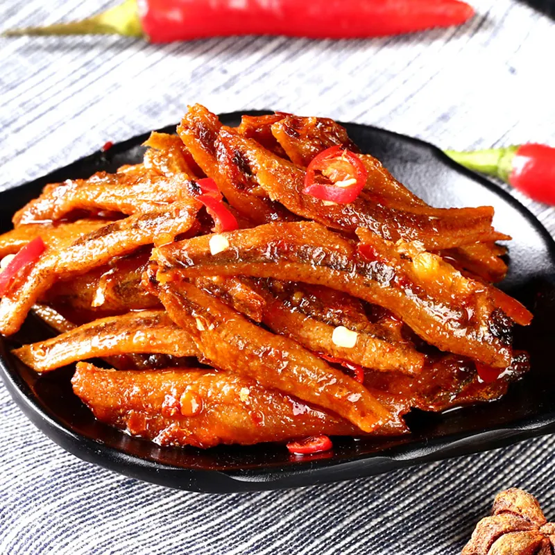 Low price calorie OEM kid chilli cinema seafood small fish spicy snacks hot sale in china