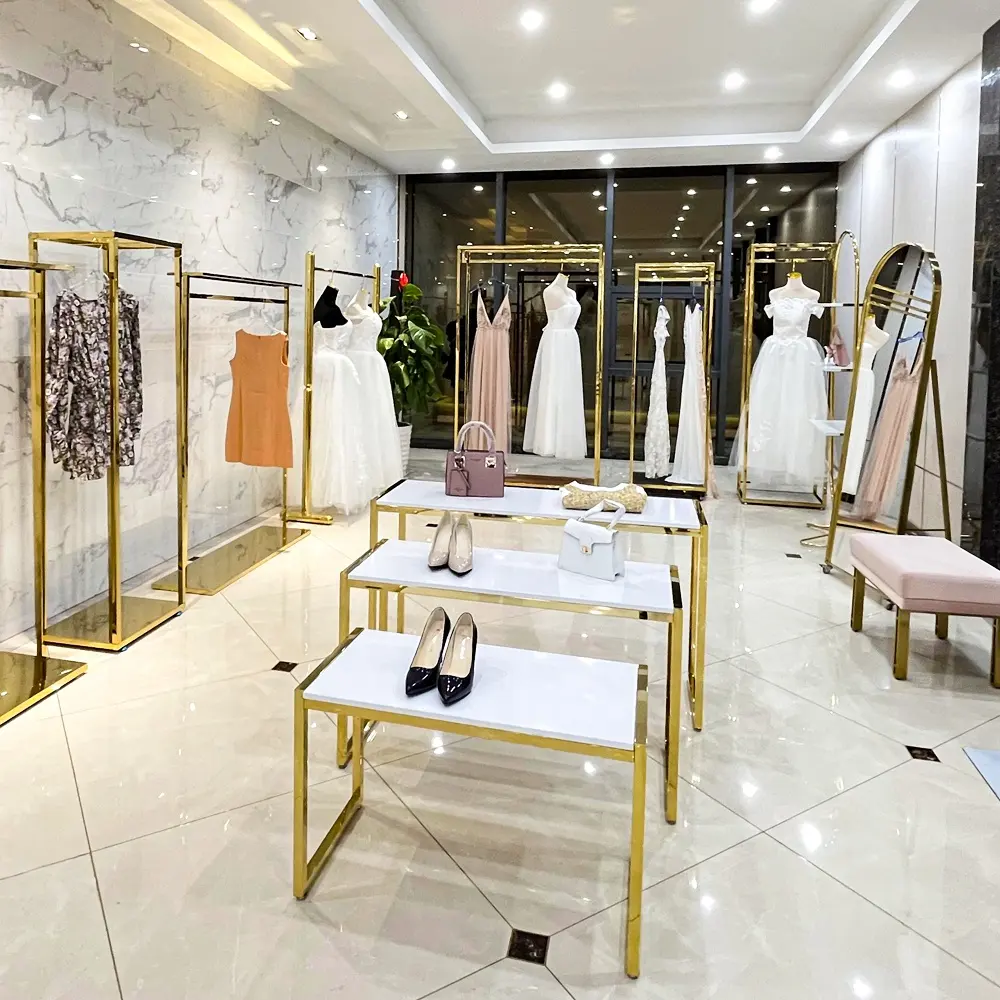 Boutique Display Rack Custom Boutique Gold Clothing Wall Mounted Rack Nesting Table Clothes Shelving Garment Display Rack Clothing Store Furniture