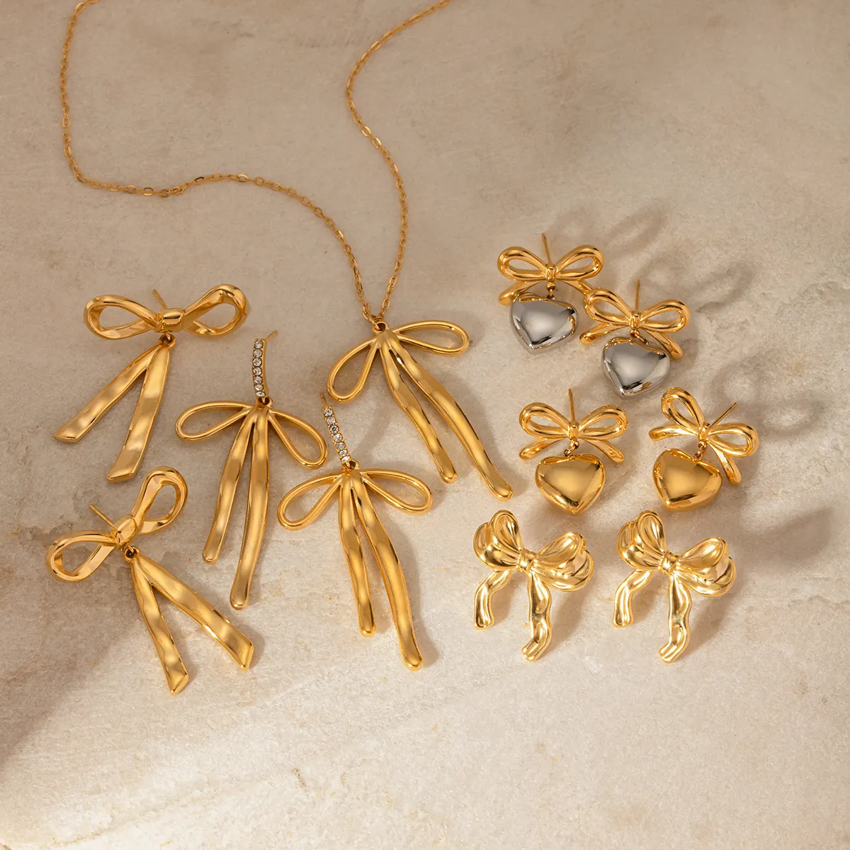 J & D новые трендовые дизайнерские кольца серии золотые украшения из нержавеющей стали лук кулон ожерелье серьги наборы