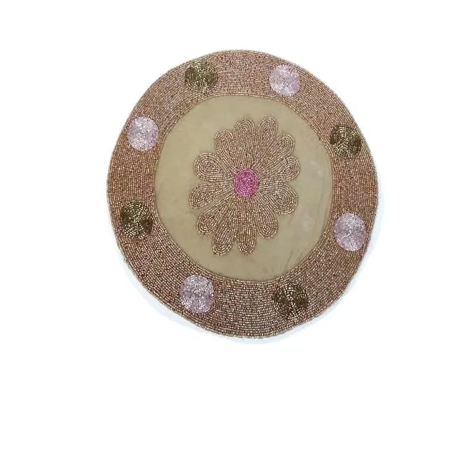 Glass bead place mats with floral patterns on brown base glass beads other patterns available