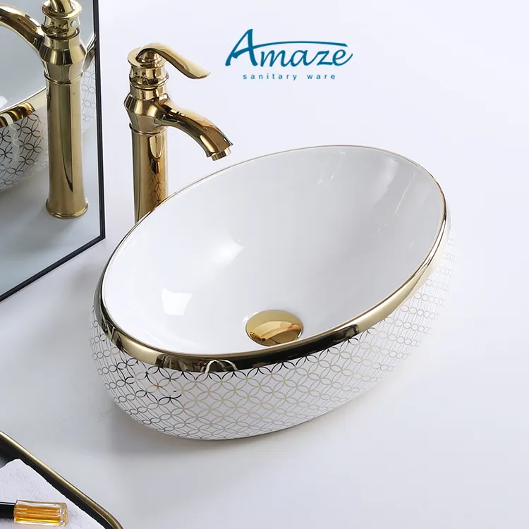 Wholesale cheap decorative no hole oval gold golden luxury hotel ceramic table top bathroom sink wc hand wash art basin