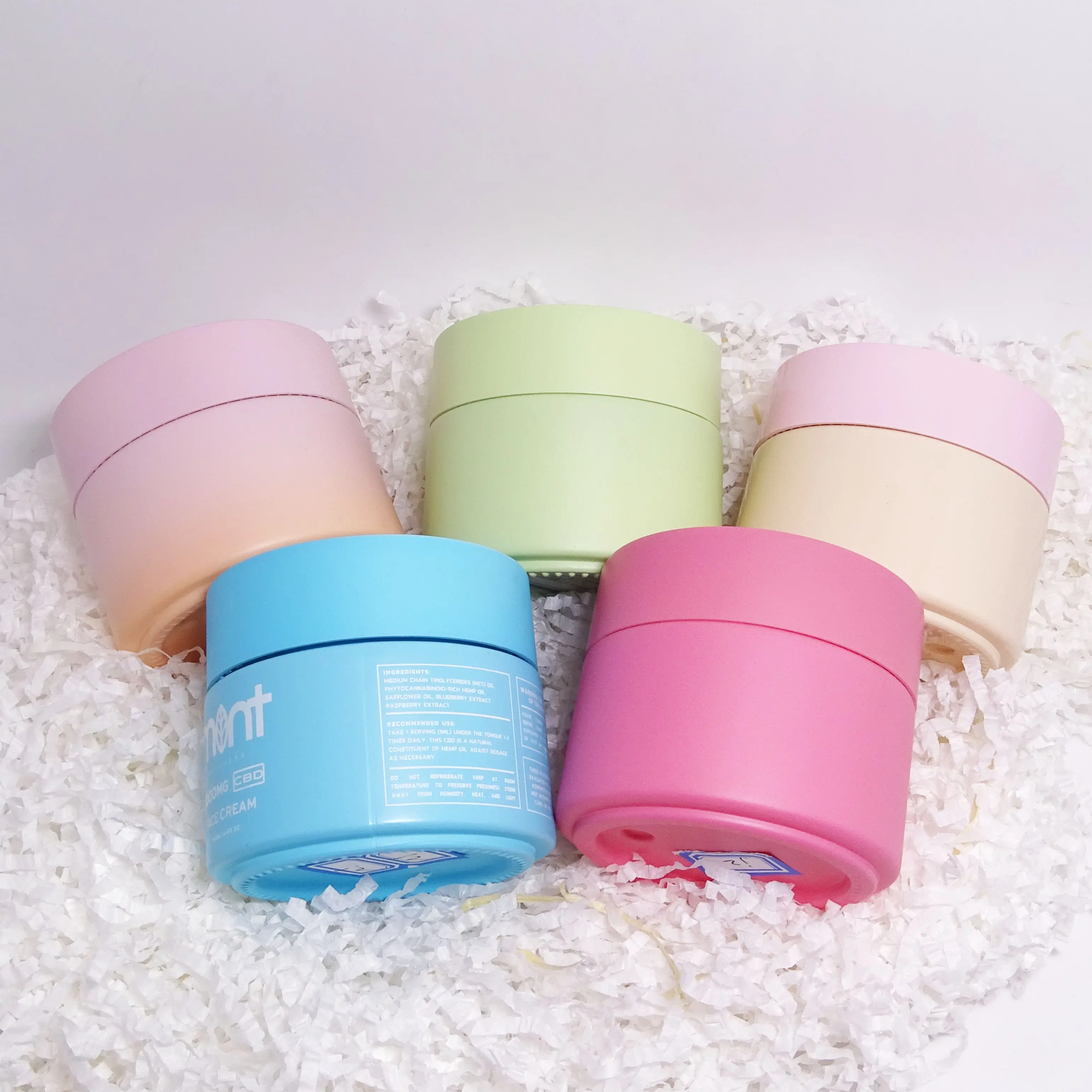 Unique cosmetics packaging factory direct 100g glass jar cosmetics matte green blue luxury colored lid