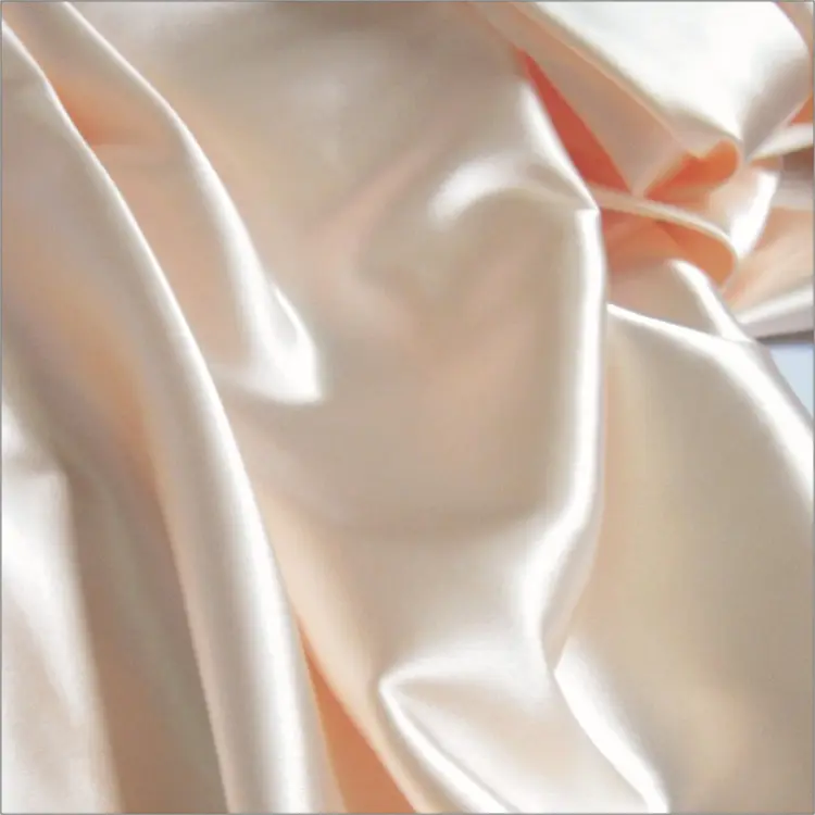 Саржевая ткань из 100% полиэстера персикового цвета для подкладки стола