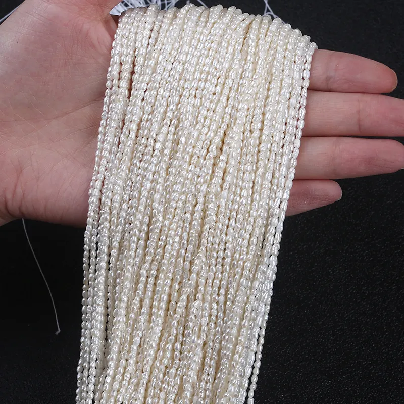 Оптом 2-2,5 мм натуральный белый рис форма пресноводный жемчуг