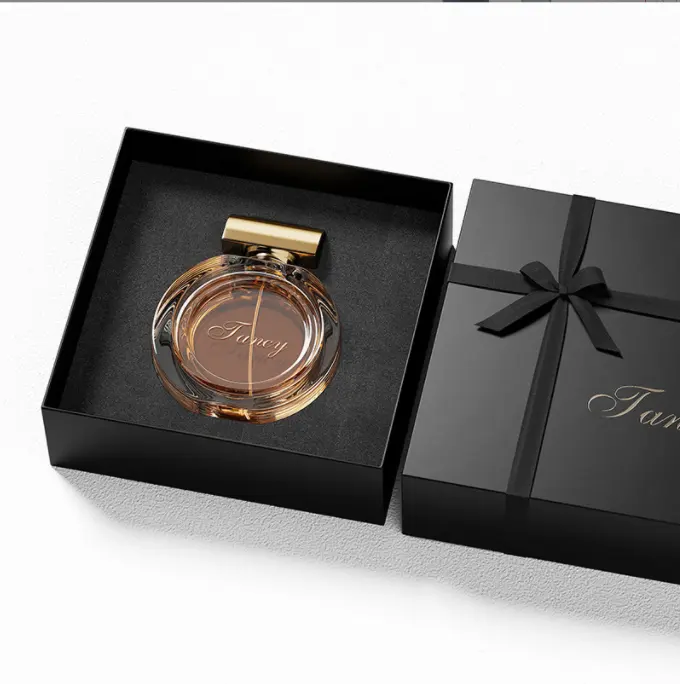 Boîte cadeau de luxe noire à couvercle rigide et base avec logo personnalisé Boîte d'emballage en papier pour bouteille de parfum avec insert en EVA