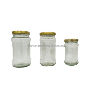 Ucuz fiyat 1000 ML <span class=keywords><strong>1L</strong></span> büyük hacimli cam yuvarlak şekil gıda depolama şeffaf cam bal/turşu kavanozu etiket etiket ile