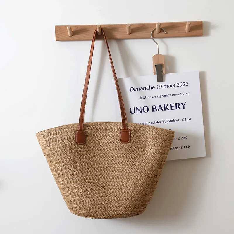 Bolsa de cesta de paja de papel hecha a mano para mujer de playa de verano ecológica con asas de PU proveedor mayorista
