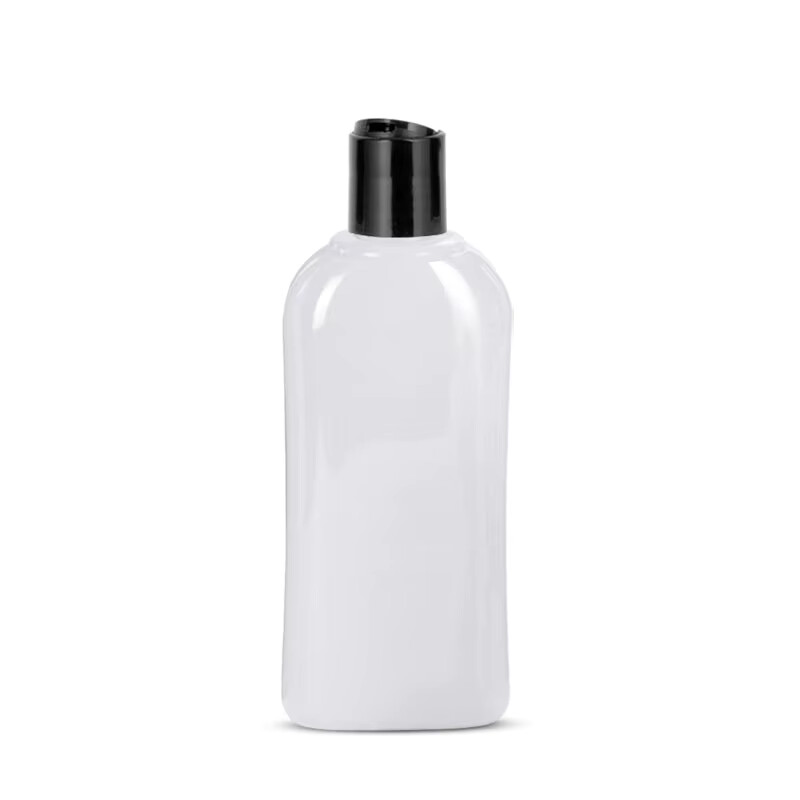 bottle with disc top cap