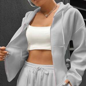 Kadın setleri özel Logo gevşek Streetwear moda rahat iki parçalı Set fermuarlı kapüşonlu kıyafet ve ter pantolon boy tam boy