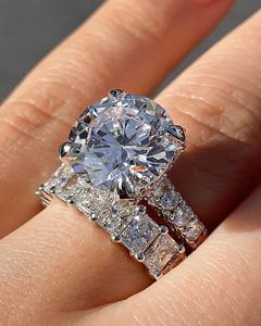 แหวนแต่งงานสีทอง14K 18K สีขาวล้วนแหวนเพชรโมอิส925สำหรับผู้หญิงแหวนหมั้นเพชรสีเงินมรกตสดใสตัดรูปไข่ - Product Image 1