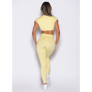 Best Selling Soft Yellow OEM Women <strong>Define</strong> Leggings &amp; Top Set With Pockets 2 Piece Women Fitness Set New High Waist Yoga Leggings