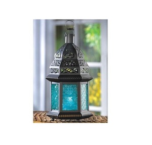 Gran farol marroquí de metal que funciona como fuente de iluminación y elemento decorativo llamativo en cualquier espacio - Product Image 6