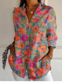 Mint green shirt with colorful flowers
