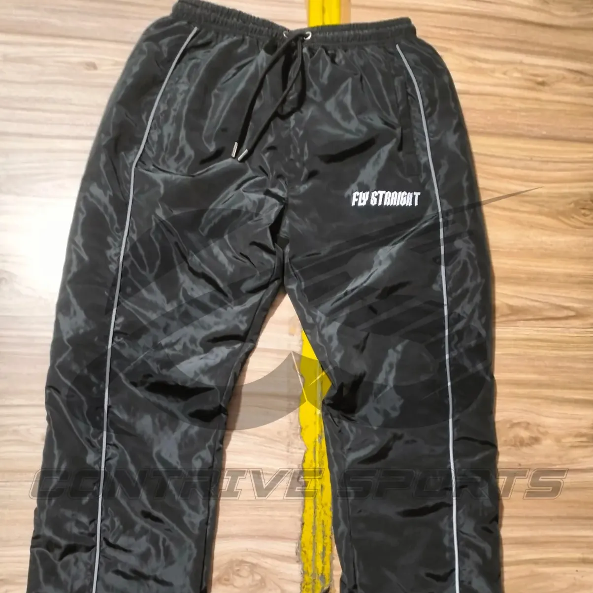 Pantaloni estivi leggeri OEM/ODM pantaloni da uomo da esterno in Nylon ad asciugatura rapida pantaloni Casual a vento