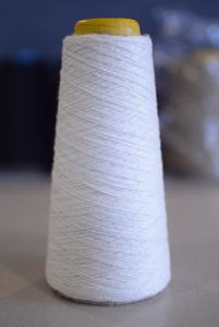 A Plus white dope dyed polyester ring spun yarn in 10/1 ne for sale in bulk order for knitting and weaving. - Product Image 3