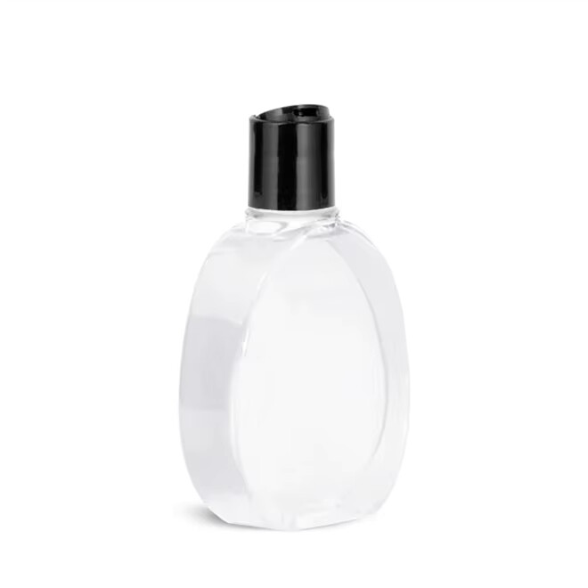 bottle with disc top cap