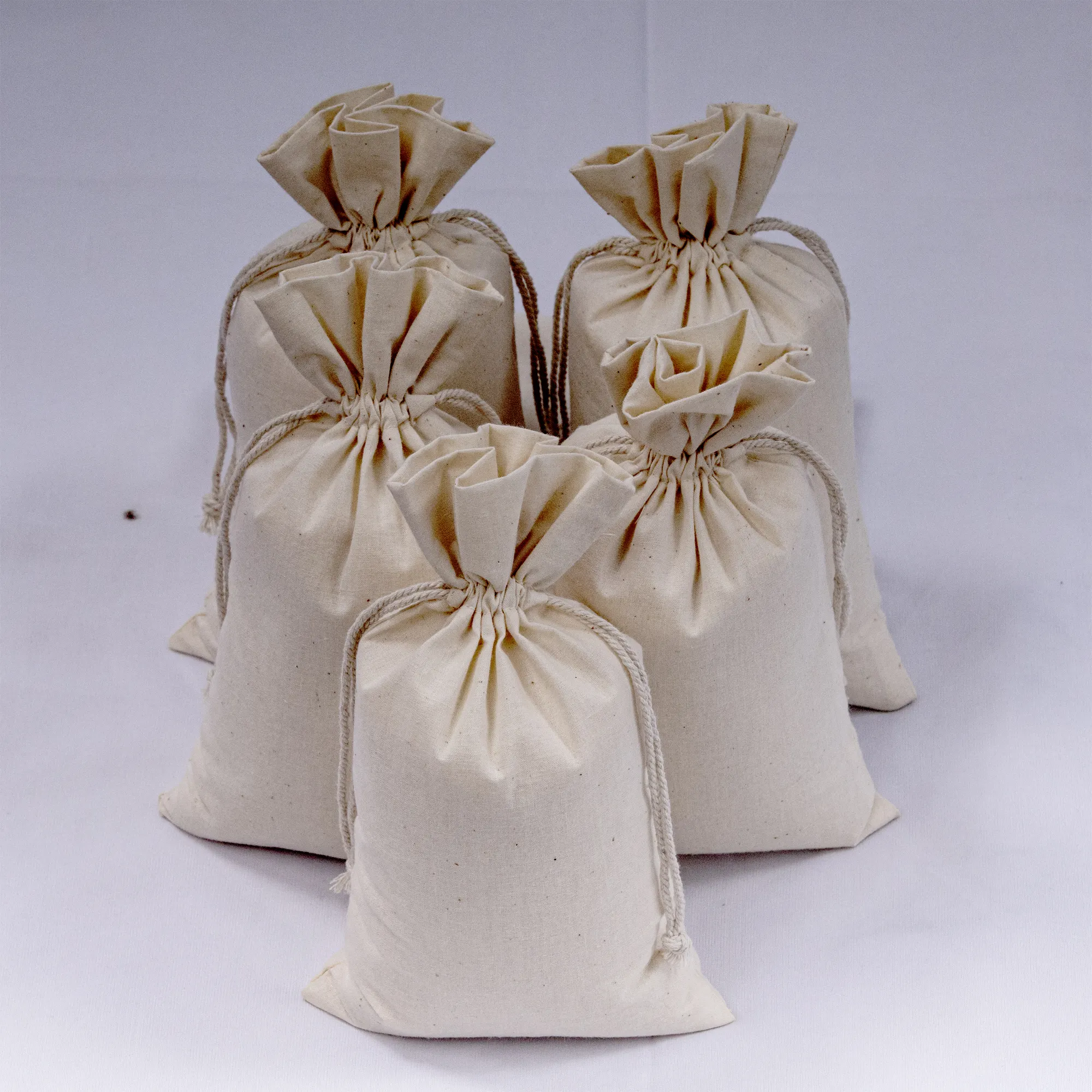 Vente en gros de sacs à cordon 100% coton sacs en mousseline naturelle durables et réutilisables sac en mousseline de coton respectueux de l'environnement