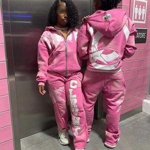 スターファッションレディーストラックスーツ2ピースセット女性秋ベルベットピンクジャケットとビッグポケットパンツ女性用ベロアトラックスーツ - Product Image 1