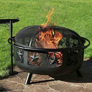 Classic <strong>round</strong> iron fire pit with sculpted legs and stable frame for evening gatherings on the <strong>patio</strong> or in the yard - Product Image 1