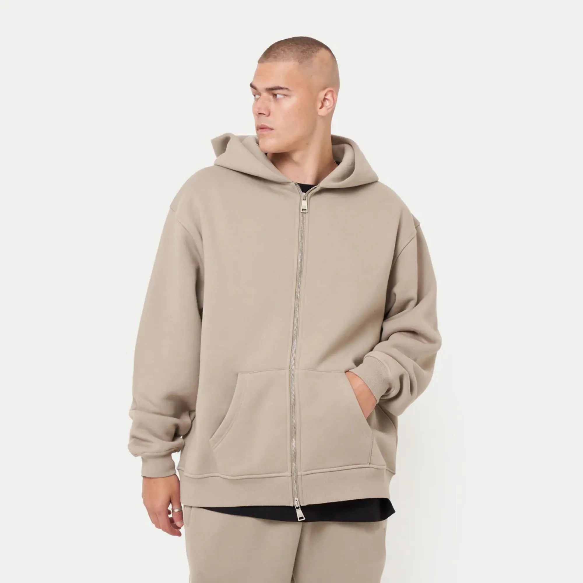 80% Cotton 20% Polyester Dropped shoulders Zip-front style Kangaroo Pockets Ribbed hem and cuffs Grey Green Oversized Hoodie