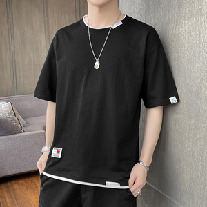 夏香港スタイルラウンドネックルーズTシャツ: スタイリッシュで多彩な男性用