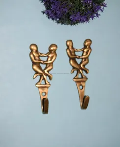 Unique Patterned Brass Couple Girls Dancing Design Wall Mount Ganchos para Pano e Hangings Key aos melhores preços