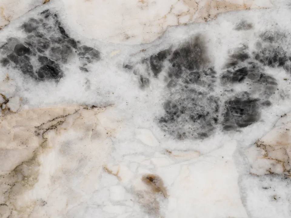 White with black and yellowness marble