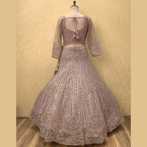 <strong>Bollywood</strong> style Mauve Colour Designer Lehenga with Dori Embroidery and Intricate Mirror Work for all Occasion at Wholesale Price