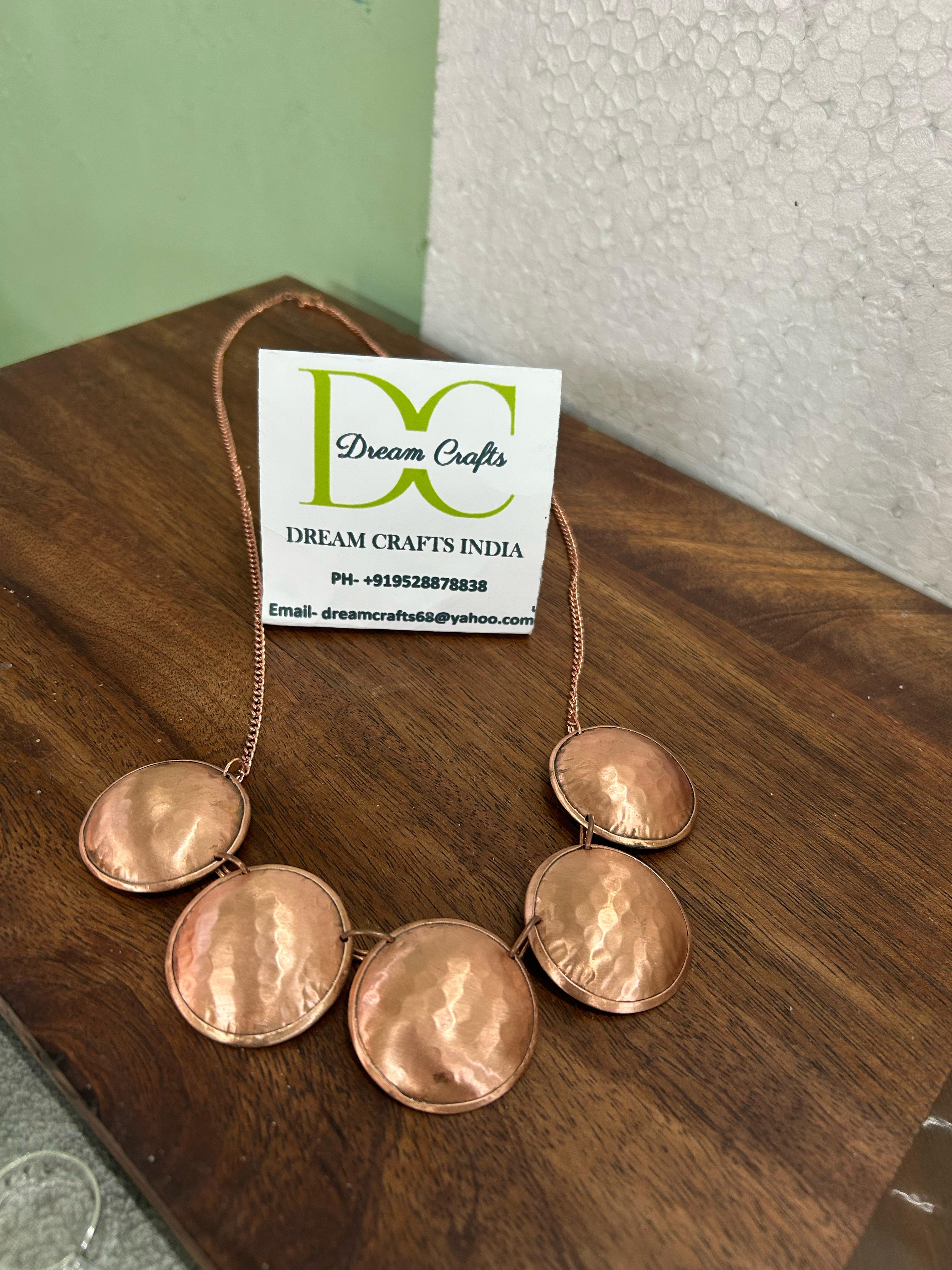 En forme de pièce de monnaie