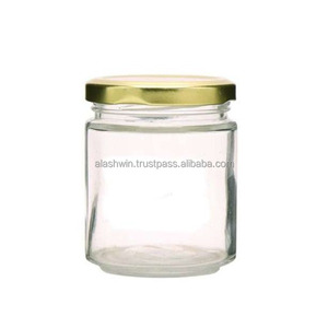 Ucuz fiyat 1000 ML <span class=keywords><strong>1L</strong></span> büyük hacimli cam yuvarlak şekil gıda depolama şeffaf cam bal/turşu kavanozu etiket etiket ile