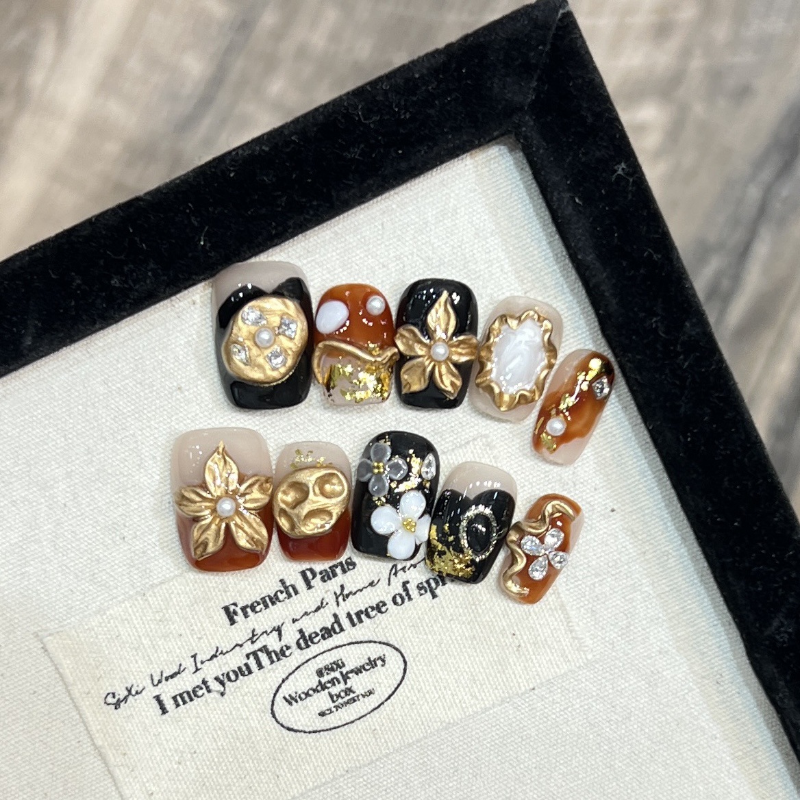 Creamy beige deep black and burnt caramel brown