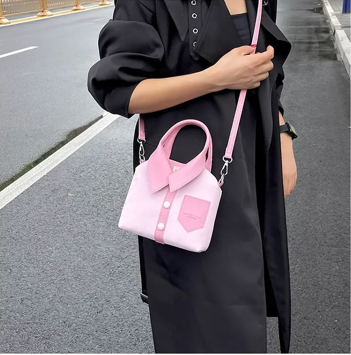 Tas tangan wanita desain kepribadian Korea, tas baju kasual mode baru 2024 tas selempang trendi sederhana