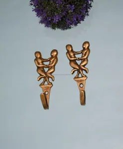 Unique Patterned Brass Couple Girls Dancing Design Wall Mount Ganchos para Pano e Hangings Key aos melhores preços