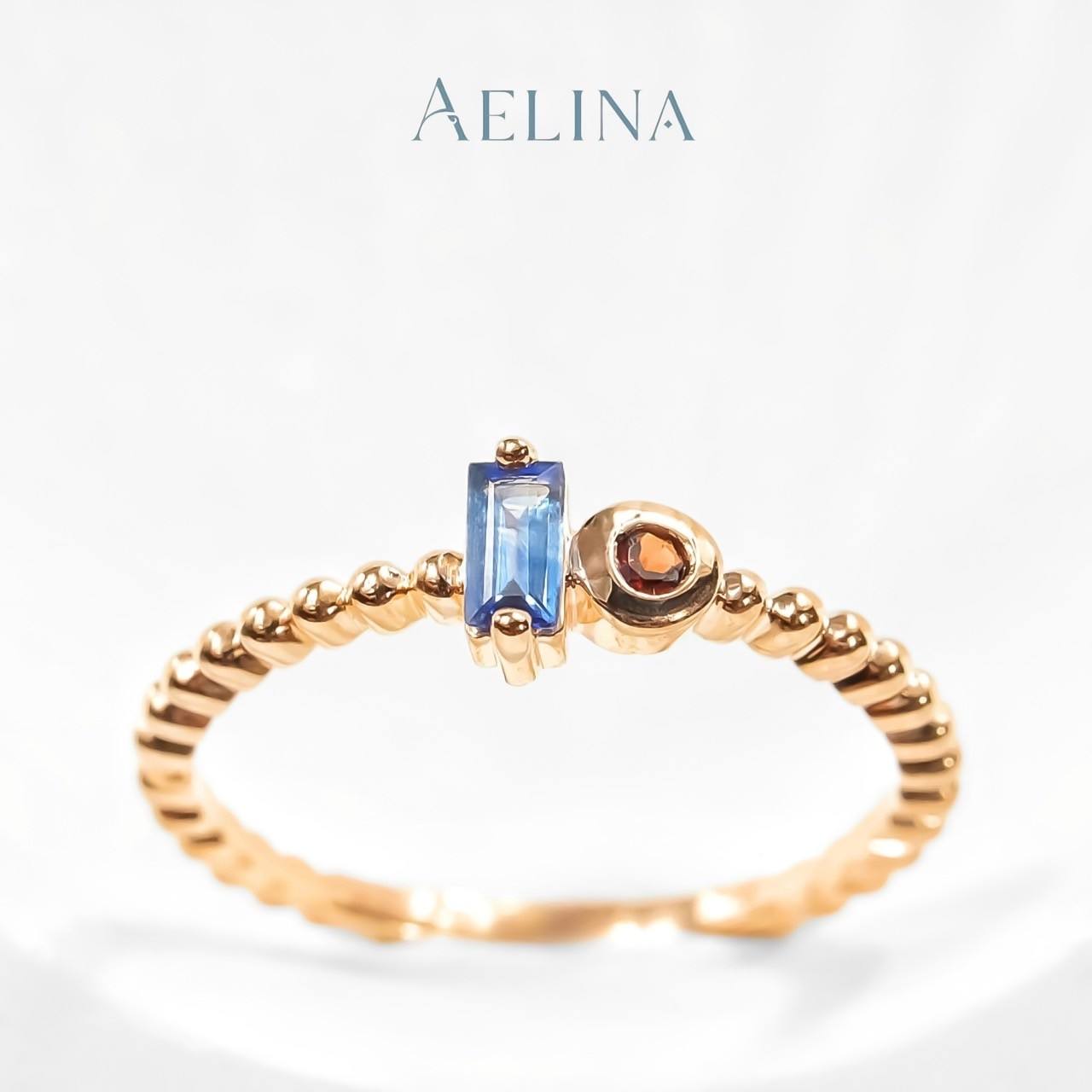 London blue topaz + Orange sapphire