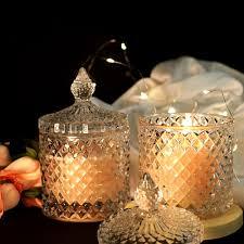 โถแก้วทำจากแก้วบริสุทธิ์พร้อมฝาปิดและการออกแบบที่เป็นเอกลักษณ์และขี้ผึ้งเต็มไปด้วยระยะเวลาการเผาไหม้นานโดย - Product Image 3