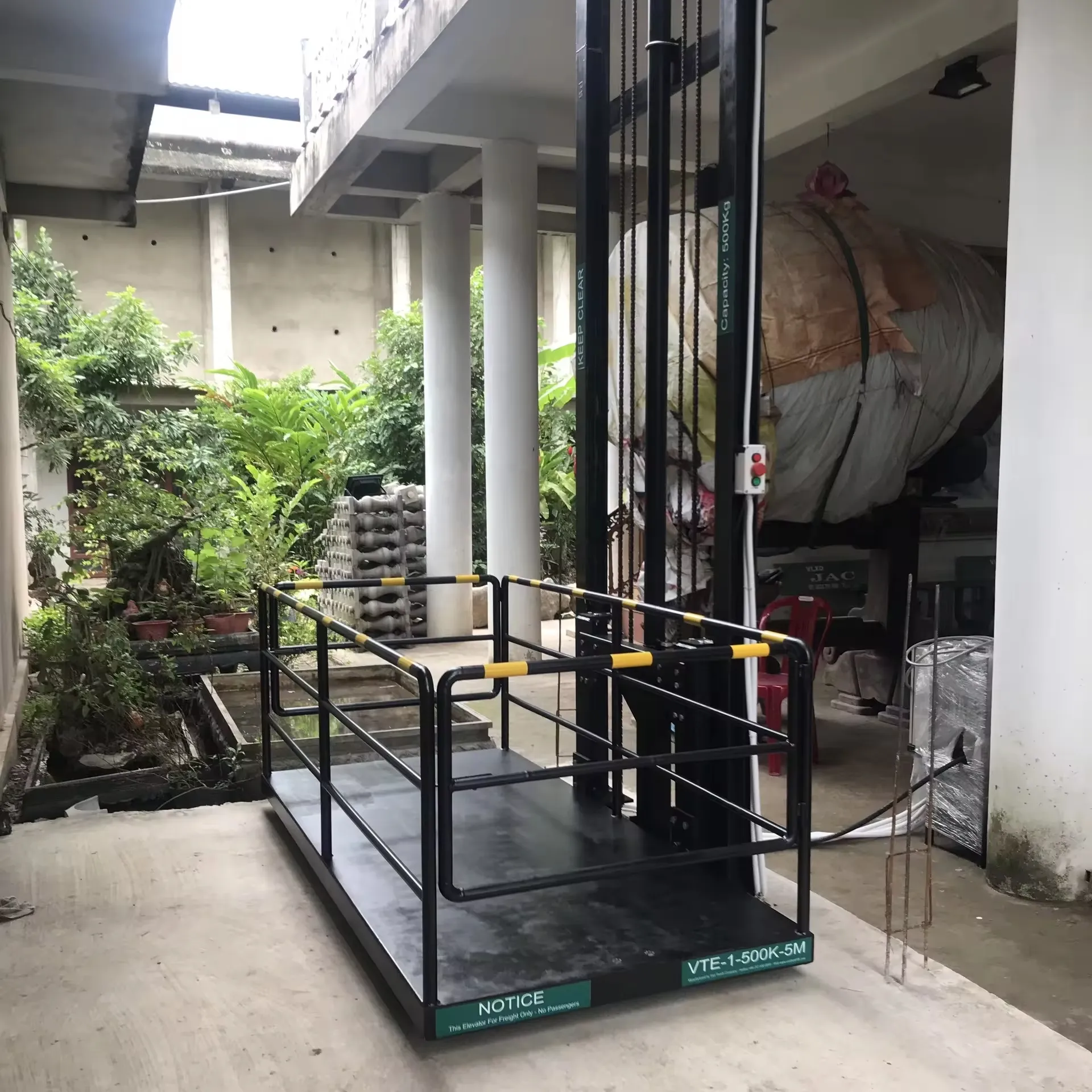 Miglior prezzo di esportazione 500kg 4M idraulico Cargo ascensore per magazzino guida verticale cargo Lift garanzia 1 anno di meccanica in Vietnam