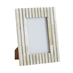 Cornice in corno di bufalo per gli amanti del design che cercano decorazioni in stile vintage fatte a mano create con materiali naturalmente belli