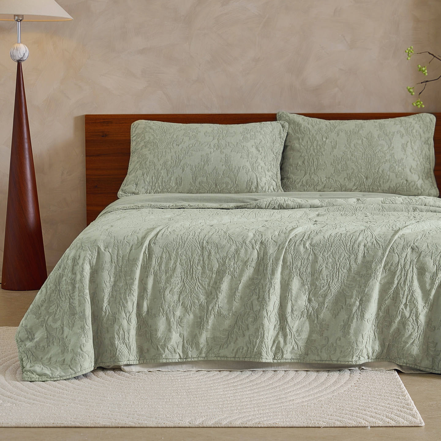 Green three-piece suit